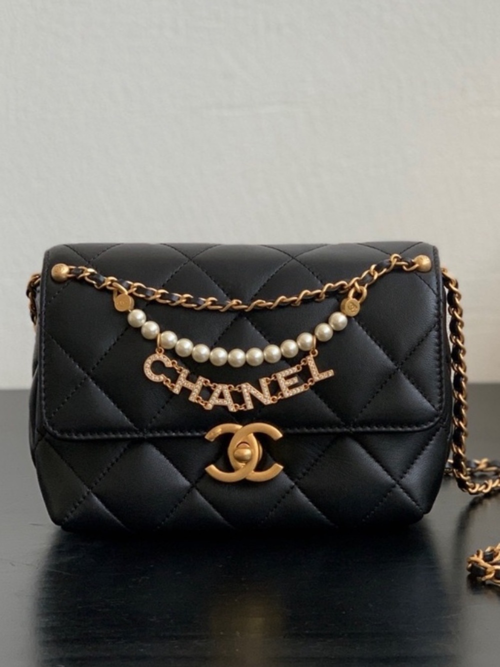 VIP black quilted black crossbody bag